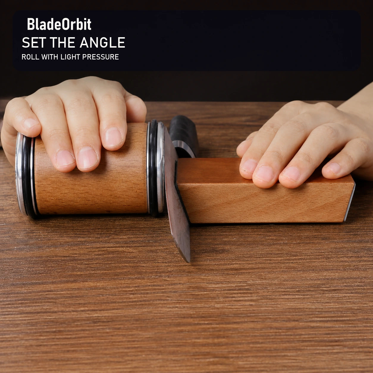 BladeOrbit rolling sharpener guided along a kitchen knife edge